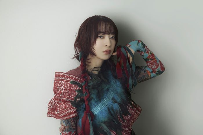 《圖說》閃耀新北1314跨河煙火八里「星月舞台」，由創作演唱《進擊的巨人》片尾曲的日本藝人樋口愛作為壓軸。〈文化局提供〉